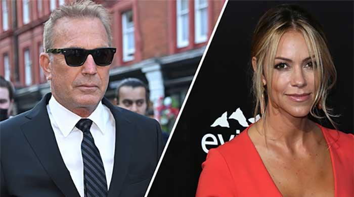 Kevin Costner's estranged wife wears Prada purse after begging