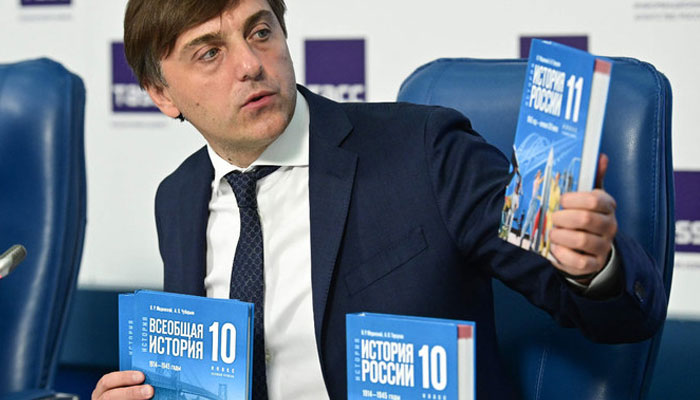 Russian Education Minister Sergei Kravtsov attends a press conference to present a new schoolbook for high school students on general world history and Russian history, mentioning the the countrys ongoing military action in Ukraine and the annexation of Crimea in 2014, in Moscow on August 7, 2023. AFP