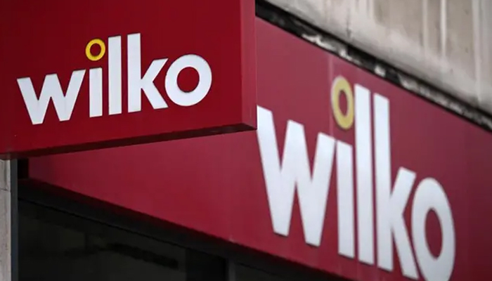 A sign of British high-street retail chain Wilko is pictured, in west London on August 3, 2023. — AFP