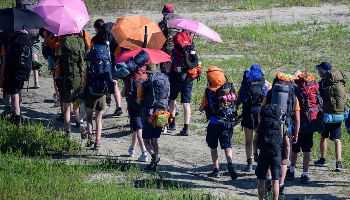 Scouts prepare to leave the World Scout Jamboree in Buan, North Jeolla province on August 8, 2023. — AFP