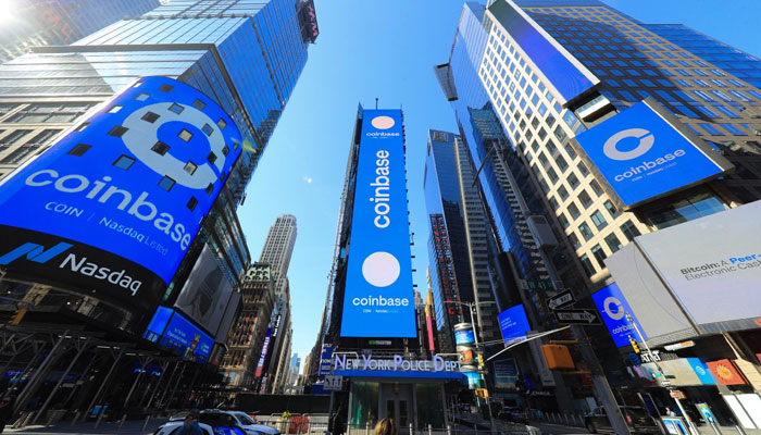 Billboards of Coinbase on buildings.—Coinbase.com/file