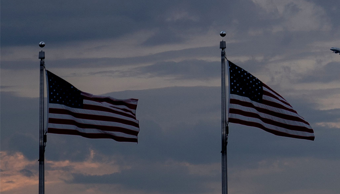 The US flags can be seen along the National Mall in Washington, DC, on July 3, 2023. — AFP