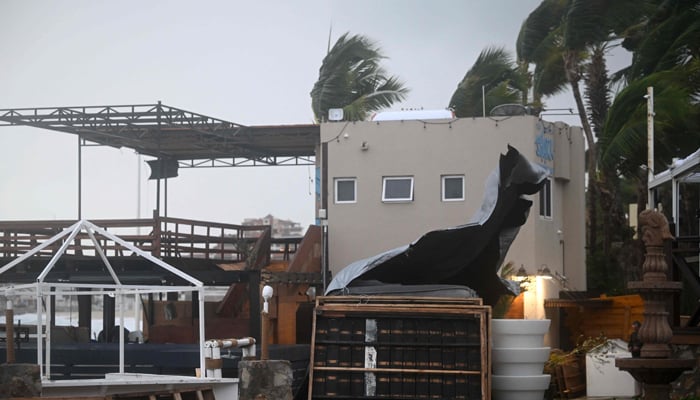 Picture taken at Medano beach as rain and gusts of wind of Hurricane Hilary reach Cabo San Lucas, Baja California State, Mexico, on August 19, 2023. — AFP