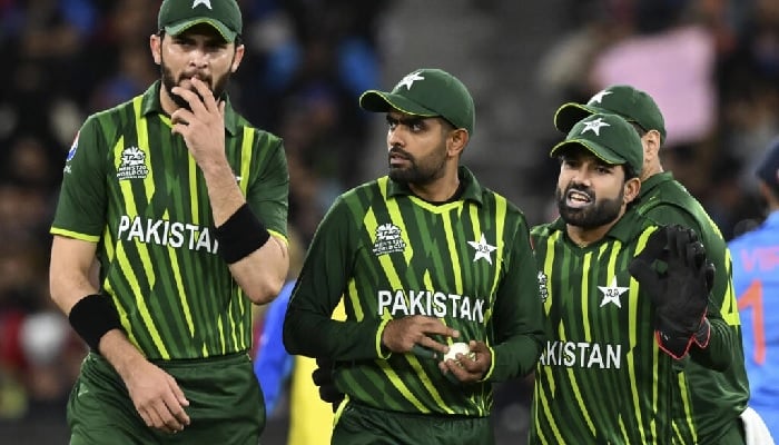 Pakistan players (left to right) Shaheen Shah Afridi, Babar Azam and Mohammad Rizwan in the field against India. — AFP