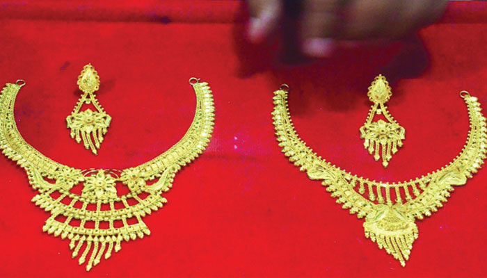 The picture shows gold necklaces. — AFP/File