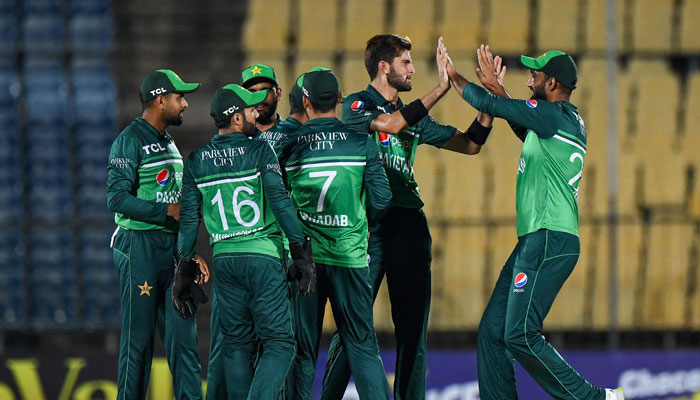 Pakistans Shaheen Afridi (2R) celebrates with teammates after taking the wicket of Afghanistans Ibrahim Zadran (not pictured) during the first one-day international (ODI) cricket match between Pakistan and Afghanistan at the Mahinda Rajapaksa International Cricket Stadium in Hambantota on August 22, 2023. — AFP