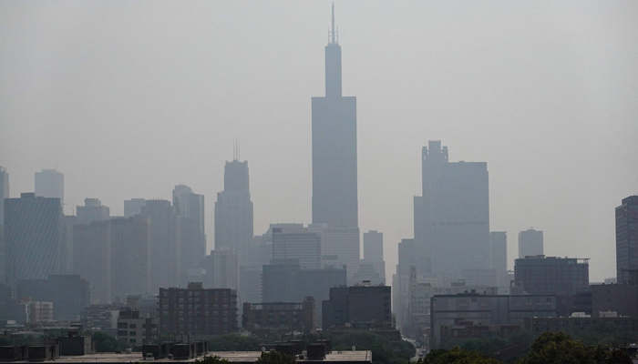 Wildfire smoke obscures the view of the skyline on June 29, 2023, in Chicago, Illinois. — AFP