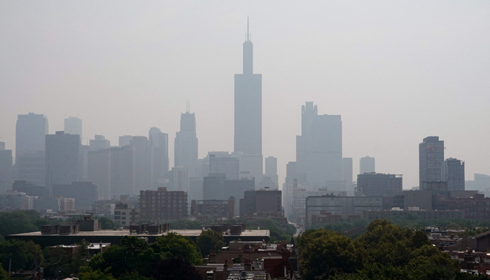 Wildfire smoke obscures the view of the skyline on June 29, 2023, in Chicago, Illinois. — AFP