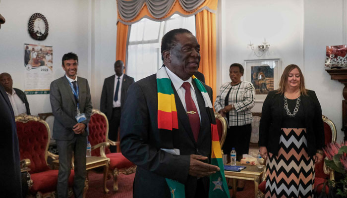 Zimbabwean President Emmerson Mnangagwa (C) receives members of the EU Election Observation Mission for a courtesy call at State House in Harare on August 21 2023. Zimbabweans will head to the polls on August 23, 2023 to vote in general and presidential elections.—AFP