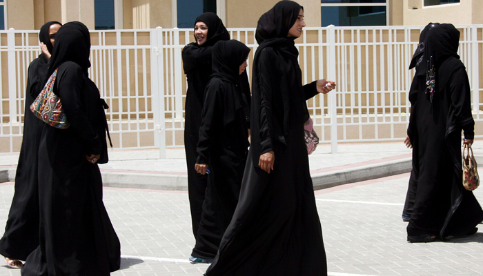 Emirati women wear traditional abayas, the long black robes worn by women in the Muslim Gulf region. — AFP/File