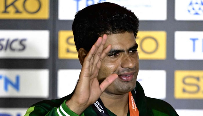 Silver medalist, Arshad Nadeem celebrates during the podium ceremony for the men´s javelin throw during the World Athletics Championships in Budapest on August 27, 2023. —AFP