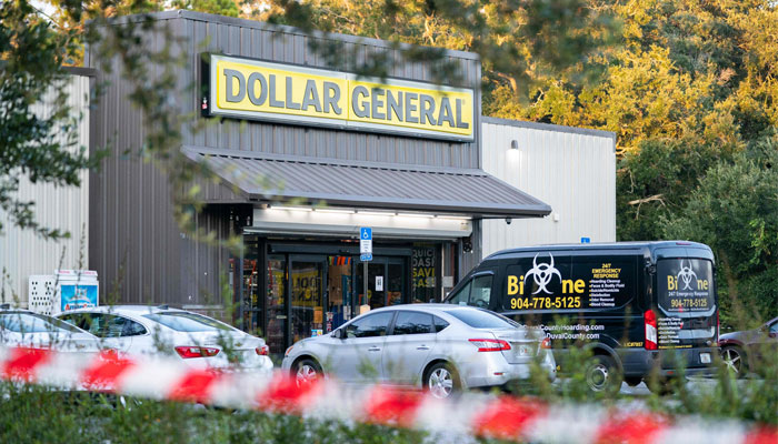 A biohazard cleanup vehicle is parked outside the Dollar General store where three people were shot and killed the day before on August 27, 2023 in Jacksonville, Florida. — AFP