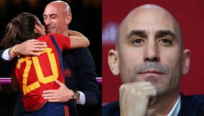 Spains defender Rocio Galvez is congratulated by the President of the Royal Spanish Football Federation Luis Rubiales (L) and Luis Rubailes in a press talk (R). —AFP/File