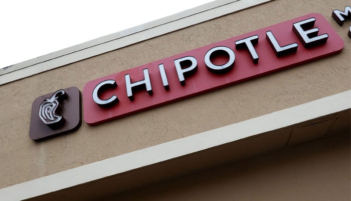 A Chipotle restaurant and signage is seen on February 09, 2022 in Miami, Florida. — AFP/File