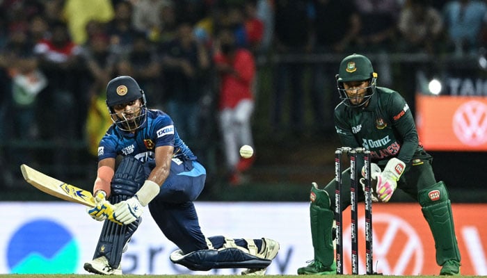 Sri Lankas Sadeera Samarawickrama (L) plays a shot during the Asia Cup 2023 one-day international (ODI) match between Sri Lanka and Bangladesh at the Pallekele International Cricket Stadium in Kandy on August 31, 2023. — AFP