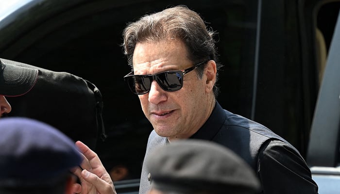 PTI Chairman Imran Khan arrives to appear in the Supreme Court in Islamabad on July 24, 2023. — AFP