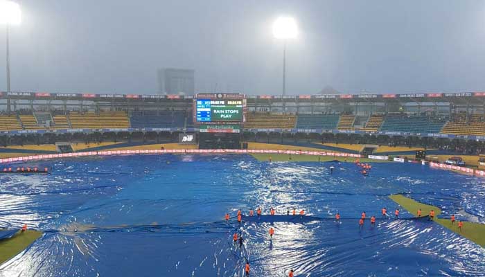 Covers are being placed on the field at Premadasa Stadium in Colombo. — PCB