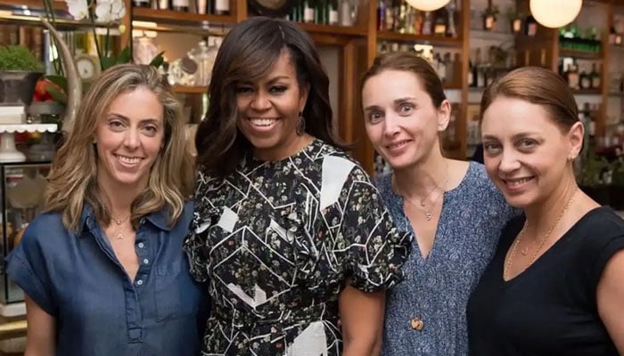 Michelle Obama with staff of Murillo restaurant. — Murillo Cafe Bistro