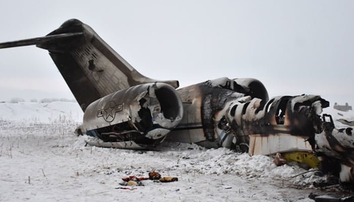 In this photograph, the wreckage of a US Bombardier E-11A jet is seen after it crashed in the mountainous territory of Deh Yak district in Ghazni province on Jan. 27, 2020. —  AFP