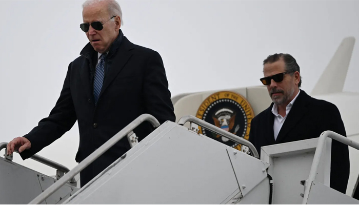 President Joe Biden, with son Hunter Biden, arrives at Hancock Field Air National Guard Base in Syracuse, New York, on February 4, 2023. — AFP