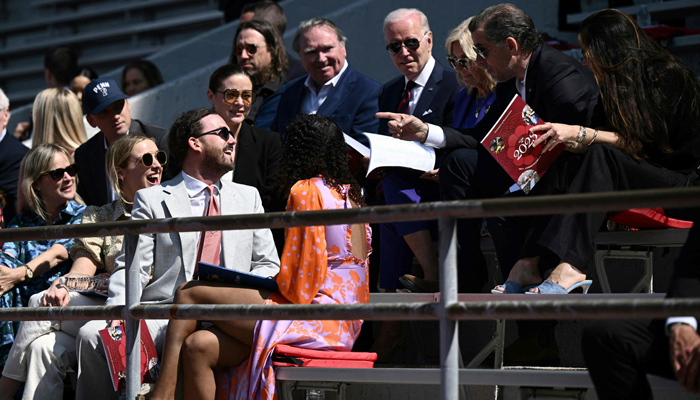 US President Joe Biden and First Lady Jill Biden joined by Hunter Biden, and Ashley Biden attend their granddaughter Maisy Bidens graduation from the University of Pennsylvania on May 15, 2023, in Pennsylvania. — AFP