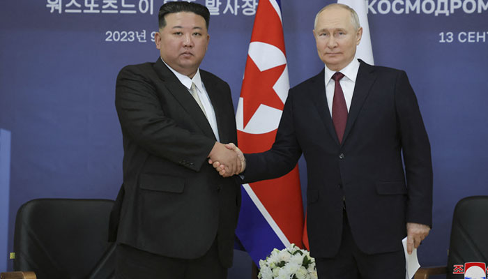 This picture taken on September 13, 2023 and released by North Korea´s official Korean Central News Agency (KCNA) on September 14 shows North Korea´s leader Kim Jong Un (L) shaking hands with Russia´s President Vladimir Putin during their meeting at the Vostochny Cosmodrome in Russia´s Amur region.—AFP