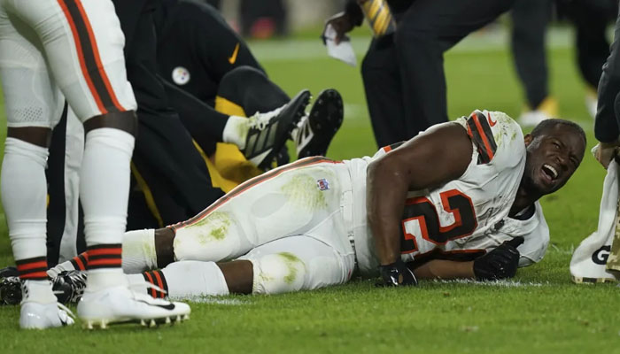 Cleveland Browns running back Nick Chubb, grimaces on the field after an injury during the first half of an NFL football game against the Pittsburgh Steelers Monday, Sept. 18, 2023, in Pittsburgh. Twitter @apnews