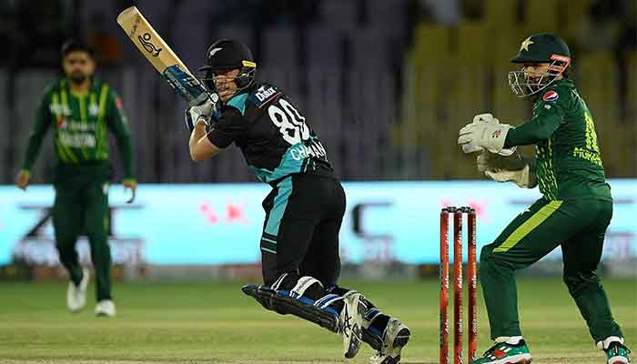 New Zealand´s Mark Chapman (C) plays a shot during the fourth T20I cricket match between Pakistan and New Zealand at the Rawalpindi Cricket Stadium in Rawalpindi, on April 20, 2023. — AFP