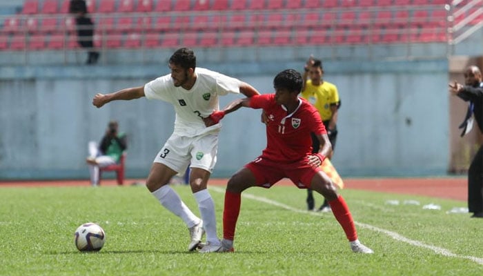 Pakistani (left) and Maldives players fighting it out in their match of the ongoing U19 SAFF Championship in Nepal on September 23, 2023. — X/@theanfaofficial