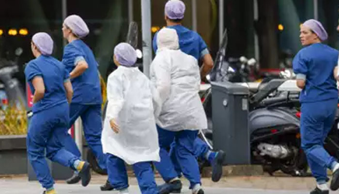 Chaos in Rotterdam university hospital after a gunman opened fire. — AFP