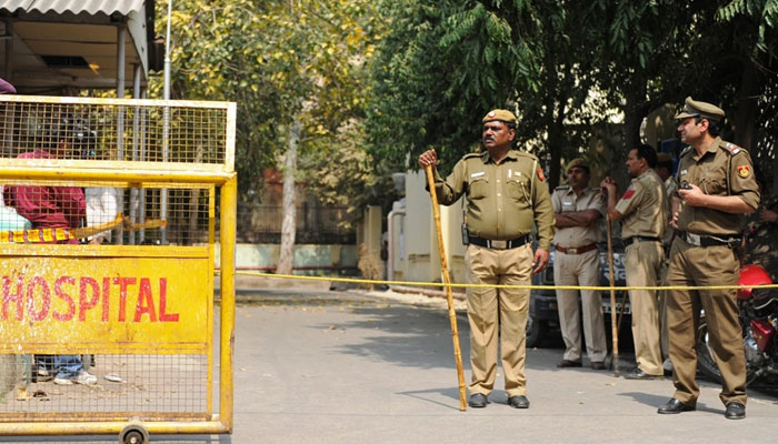 This representational image of police standing outside a hospital. — AFP/File