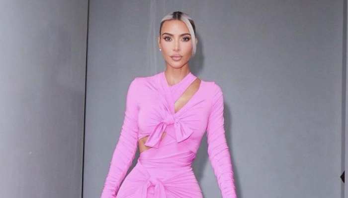 Kim Kardashian attends Victoria Beckham’s fashion show in body-fit slinky gown