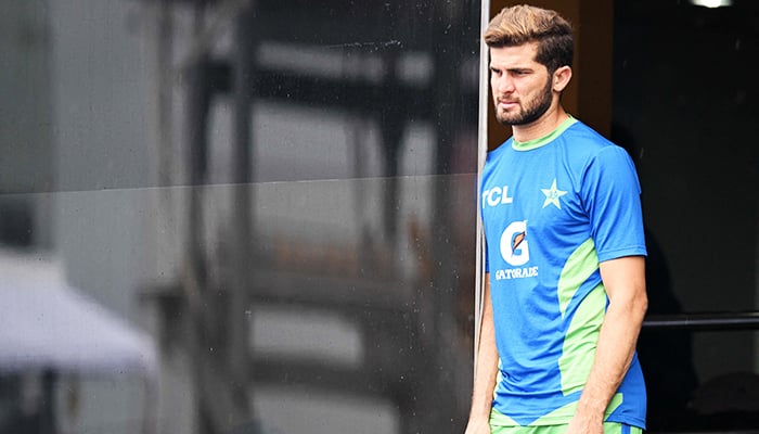 Pakistans Shaheen Shah Afridi looks on as he waits for the start of the Asia Cup 2023 super four ODI cricket match between India and Pakistan at the R. Premadasa Stadium in Colombo on September 11, 2023. — AFP