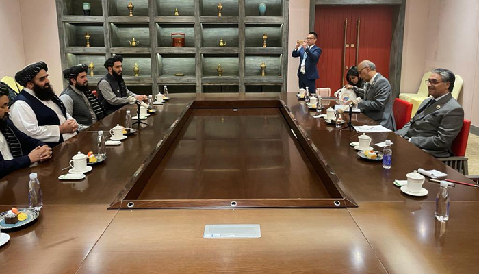 Interim Foreign Minister Jalil Abbas Jilani (left) meets his Afghan counterpart Amir Khan Muttaqi (centre left), in Tibet, China, on October 5, 2023. — X/ForeignOfficePk