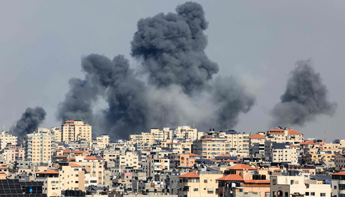 Smoke billows over Gaza City on October 7, 2023, during Israeli air strike. — AFP