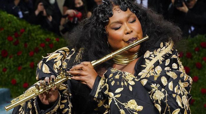 Lizzo's outfit on a private jet sparks debate about what is