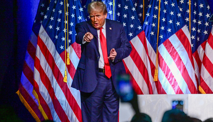 Former US President and 2024 Republican presidential hopeful Donald Trump gestures at the end of a campaign event at Club 47 USA in West Palm Beach, Florida, on October 11, 2023. — AFP