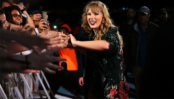 Even the popcorn cups and buckets can’t escape the Taylor Swift mania