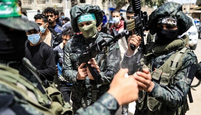 Fighters with the Izz-Al Din Al-Qassam Brigades, the armed wing of the Hamas movement, in Nuseirat refugee camp in the central Gaza Strip, on April 18, 2021. — AFP