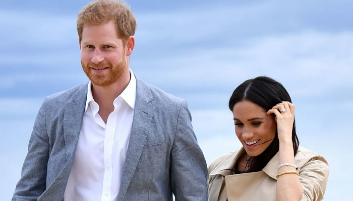 Prince Harry, Meghan Markle cant keep hands off each other on romantic trip