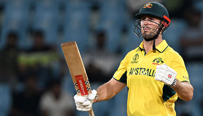 Australias Mitchell Marsh celebrates after scoring a half-century (50 runs) during the 2023 ICC Men´s Cricket World Cup one-day international (ODI) match between Australia and Sri Lanka at the Ekana Cricket Stadium in Lucknow on October 16, 2023. — AFP