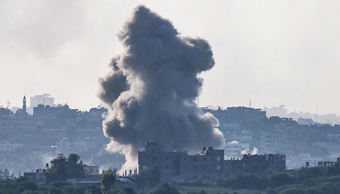 This picture taken from Israels southern city of Sderot shows smoke billowing over the northern Gaza Strip during Israeli bombardment on October 18, 2023, amid ongoing battles between Israel and the Palestinian group Hamas. — AFP