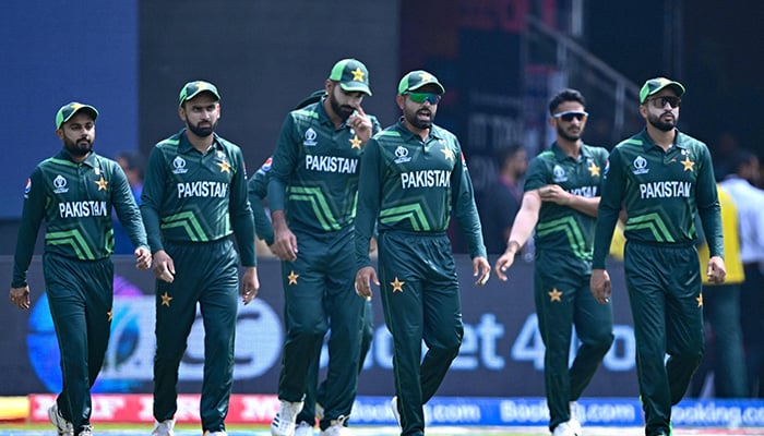 Pakistans captain Babar Azam (C) along with teammates arrives on ground for the 2023 ICC Men´s Cricket World Cup one-day international (ODI) match between Australia and Pakistan at the M. Chinnaswamy Stadium in Bengaluru on October 20, 2023. — AFP