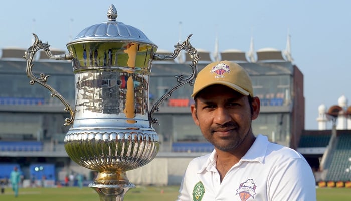 Sarfaraz Ahmed poses with the Quaid-e-Azam Trophy in Lahore, on October 26, 2023. — X/@TheRealPCB