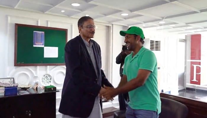 PCB Management Committee Chairman Zaka Ashraf greets Karachi Whites captain Sarfaraz Ahmed at Pakistan cricket headquarters in Lahore in this still taken from a video. — X/@TheRealPCB