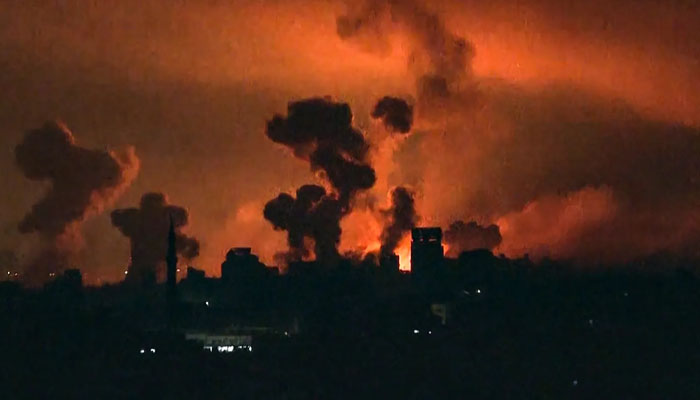 This image grab from an AFP TV footage shows fire and smoke rising above Gaza City during an Israeli strike on Oct. 27, 2023. — AFP