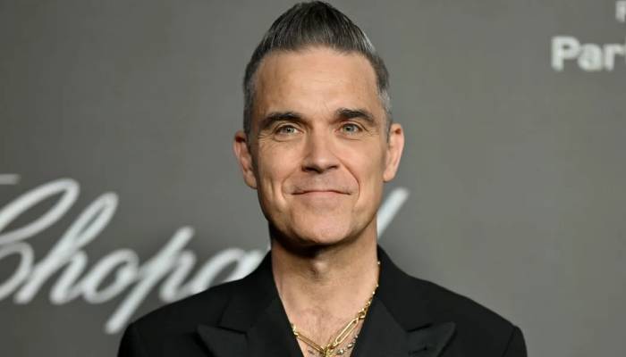 Robbie Williams explains how music bands lead to mental health problems