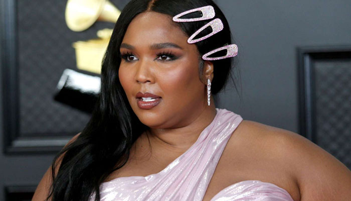 Lizzo dresses as Elvira: Mistress of the Dark for Halloween