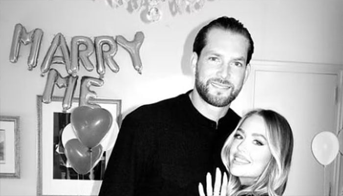 Lottie Tomlinson shines bright with stunning diamond ring as she and Lewis Burton say yes to new chapter.