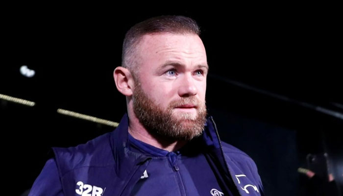 Wayne Rooney gestures during a match. — AFP/File